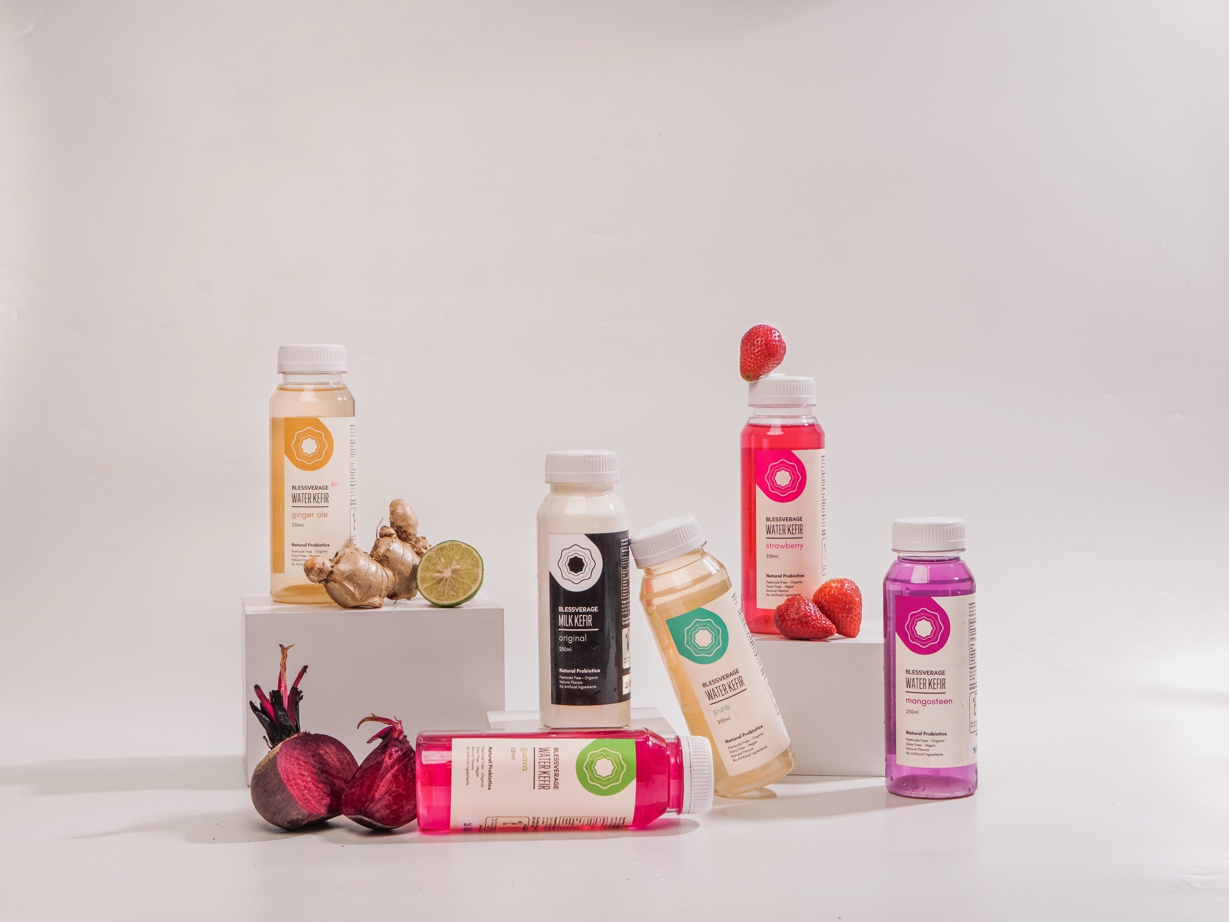 The Blessverage water kefir and milk kefir range with fresh ginger, lime, strawberry and beetroot